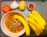 A picture of step 11 of Lasaniya Bhungla Batata🥔🌶️🧄🍅Kathiyawadi Garlicky Potato Curry Served with Piped fryums😋.