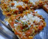 A picture of step 12 of Chicken bread pizza.