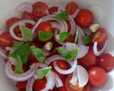 A picture of step 3 of Tomato, red onion, basil and balsamic salad.