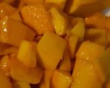 A picture of step 1 of Mango shake with chunks.