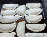 Foto del paso 3 de la receta: Empanadas de jamón y queso al horno