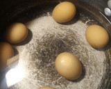A picture of step 1 of Deviled Eggs in a Salad.