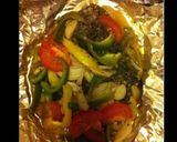 Une image de l'étape 5 de Papillote de calamars aux oignons tomates et poivrons.