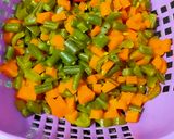 A picture of step 1 of Corn Capsicum Beans Masala.