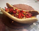 A picture of step 3 of Healthy banana split boat for breakfast. With granola and almond butter.