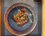 Foto del paso 6 de la receta: Asado de tira en vino tinto con papas de colores al horno