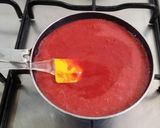 A picture of step 4 of Strawberry milk shake with dollop of strawberry ice cream.