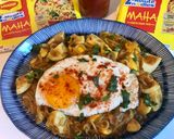 A picture of step 7 of Egg Masala Maggi.