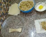 A picture of step 3 of Spaghetti wraps.