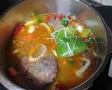Foto del paso 3 de la receta: Ossobuco en olla express con papas fritas al ajillo