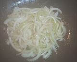 A picture of step 1 of Calamari stewed in Tomatoes.