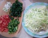 A picture of step 1 of Singaporean rice.