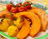 A picture of step 4 of Pumpkin in the oven with tomatoes.