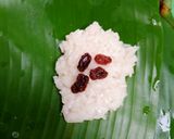 A picture of step 2 of Thai Sticky Rice Parcels with Raisins.