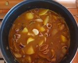 Foto del paso 5 de la receta Guiso de patatas con calamar, alcachofas y habitas tiernas