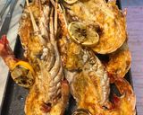 Foto del passaggio 3 della ricetta Aragosta grigliata al burro e aglio