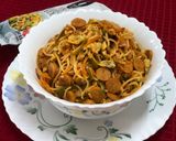 A picture of step 16 of Schezwan Egg Sausage Noodles.