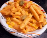 A picture of step 3 of Penne pasta with cheese.