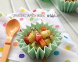 Foto langkah ke 3 dari resep Tropical fruit salad with honey-lemon dressing.