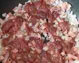 Foto del paso 3 de la receta: Guisado de higaditos y mollejas de pollo