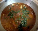 A picture of step 16 of Aloo Qeema.