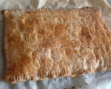 Foto del paso 4 de la receta: Empanada de hojaldre rellena de atún y tomate
