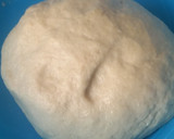 A picture of step 3 of Soft layerd Coconut chapati.