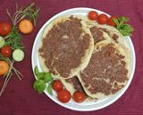 A picture of step 3 of Manakish Lahm bi Ajeen with 10-Minute Dough.