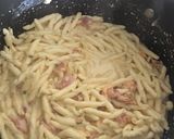 A picture of step 5 of Bacon and three cheese carbonara with strozzapreti pasta.