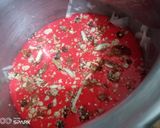 A picture of step 7 of Red velvet Cake with custard layering.