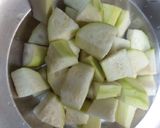 A picture of step 1 of Bottle gourd with chana dal.