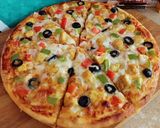 A picture of step 6 of Chicken Tikka Pizza 🍕🍕.