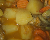 Foto del paso 6 de la receta: Estofado de alcachofas, patatas y langostinos