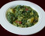 A picture of step 7 of Spinach potato koottu with rice.