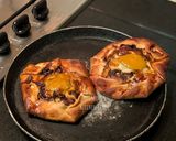 A picture of step 14 of Mushroom and egg Galette.