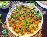 A picture of step 5 of Dry Arbi Masala.