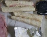 Foto del paso 5 de la receta: Fajitas rápidas de jamón y queso gratinadas en manteca