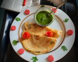 A picture of step 3 of Moong Dal Chilla.