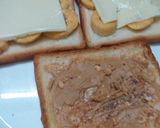 A picture of step 3 of Cheesy Banana Peanut Butter Toast.