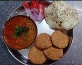 A picture of step 6 of Kathiyawadi Special Chapdi Undhiyu - A dinner thali.