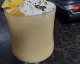 A picture of step 6 of Mango Shake with ice cream.