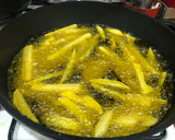 Foto del paso 10 de la receta: Cordero al ajillo con patatas fritas y champiñones rellenos