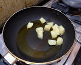 A picture of step 3 of Moong Dal Diye Lau Ghonto.
