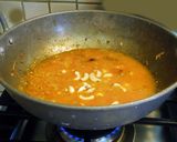 A picture of step 5 of LEHSUNI PANEER gravy.