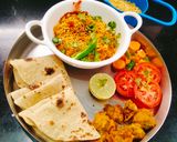 A picture of step 6 of Sev tamatar nu shaak (Gujarati dinner sabji with phulka).