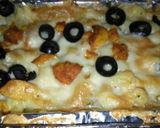 A picture of step 11 of Chicken olives baked pasta.
