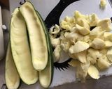 Une image de l'étape 3 de Courgettes farcies au riz,thon,épices et parmesan.