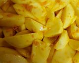 A picture of step 5 of Roast potatoes, carrots served with cabbage and kachumbari.