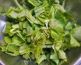 Foto del paso 2 de la receta: Rúcula con ajo picado