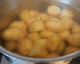 A picture of step 1 of Pan fried sea bass fillets with mediterranean potato salad.
